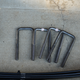 New U-bolts, nuts and lock washers.
